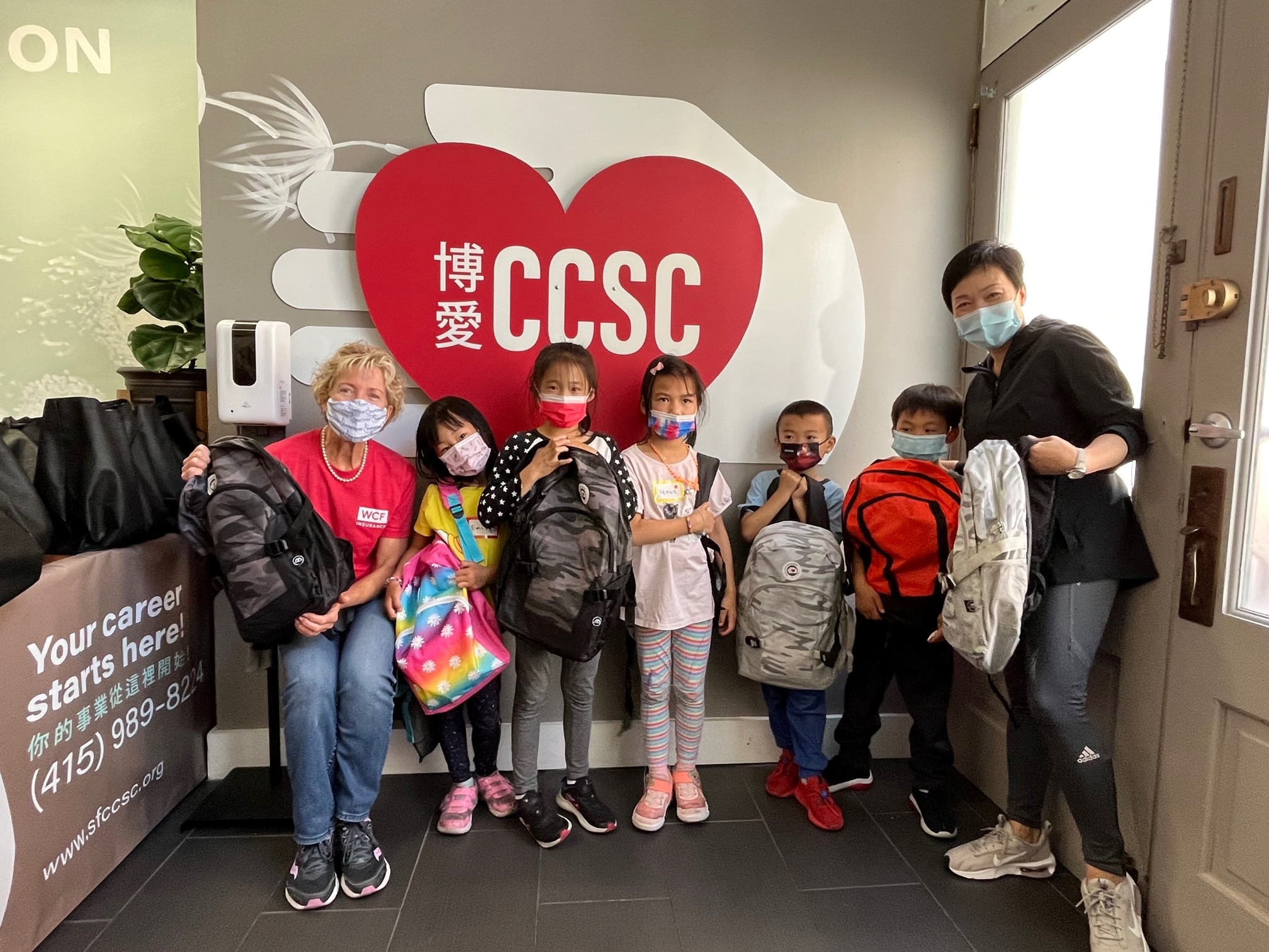 Delivering a donation of ready-made backpacks just in time for the new school year.